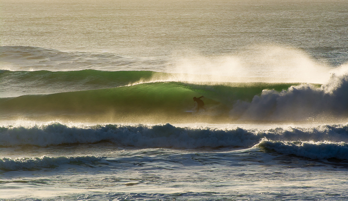 Skyler Stokes into a backside green beaut.  Skyler has said this is by far the best day he has ridden at his local honey hole. Photo: Michael Bonwell