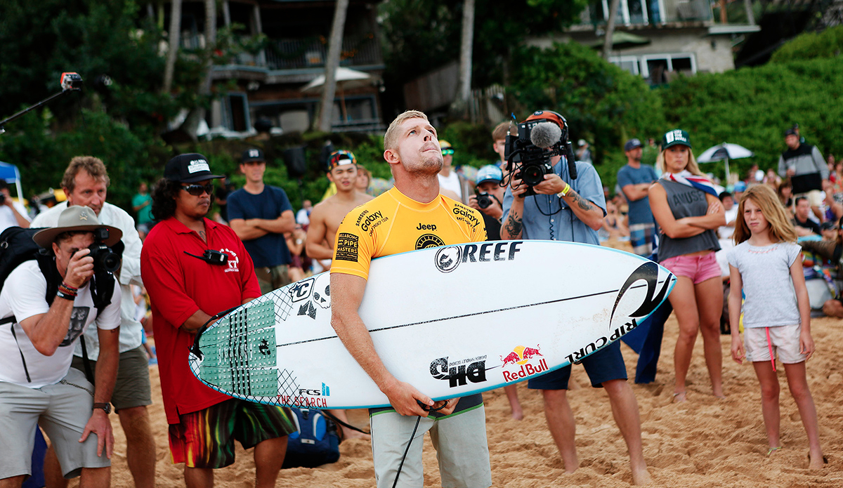 Mick Fanning of Australia takes a moment to look up to the heavens before his quarterfinal heat against Kelly Slater (USA) at the Billabong Pipe Masters. Photo: WSL / Kirstin