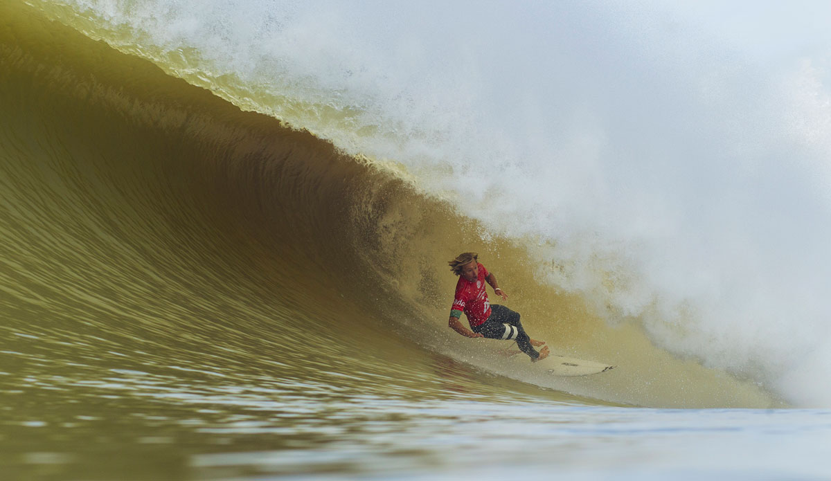 Adrian Buchan wipes out while surfing inside a barrel during Round 2 of the Moche Rip Curl Pro in Portugal. Buchan was eliminated from the event when he was defeated by advancing surfer Aritz Aranburu. Photo: <a href=\"http://www.aspworldtour.com/\">Damien Poullenot</a>