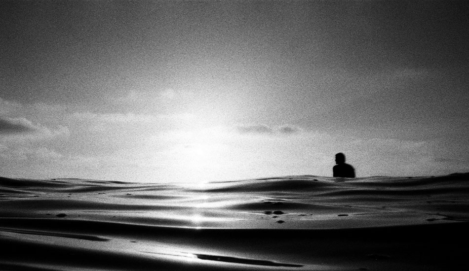 Cris Loomis again, taking in the oil-glass sunset at the cliffs. Nikonos V, kodak tmax 3200 film. Photo: <a href=\"http://fotoburns.com\">Adam Burns</a>