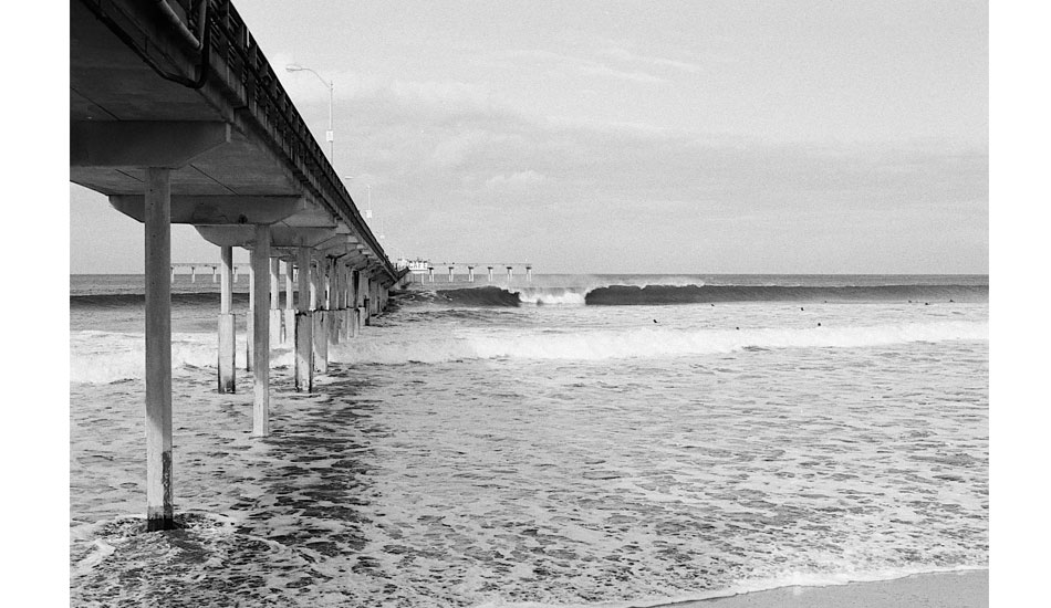 Ah, the good \'ol pier. Don\'t wear a cord unless you want 30lbs of seaweed wrapped around it.  Nikon fm10, fuji neopan 400 film. Photo: <a href=\"http://fotoburns.com\">Adam Burns</a>