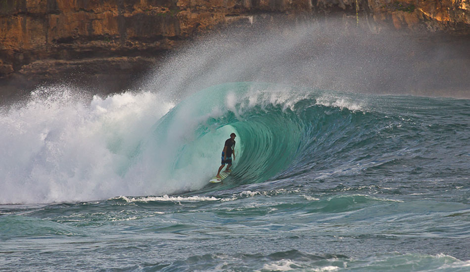 This spot is my favourite spot in Indo to shoot, and it\'s also one of Anthony Walsh\'s favourite too. This wave is so amazing as it is not perfect in any sense, but Walshy always seems to make it look so perfect. Photo: Brad Masters