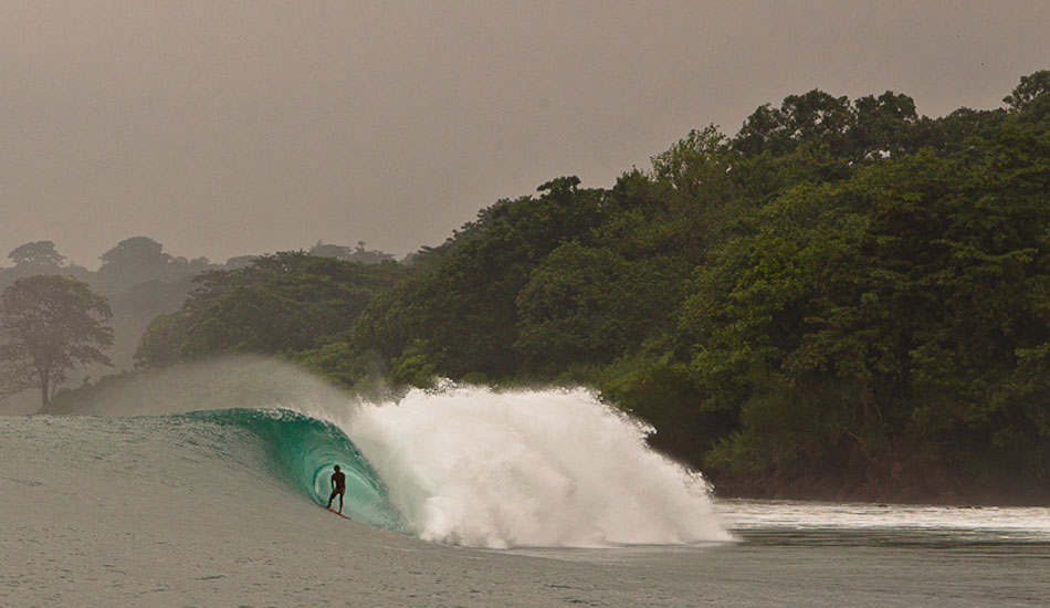 Mikala makes his life about this. He has probably clocked more time in the barrel than any other surfer. Shooting with Mikala in waves like this, you always know you are going to score some of the best photos of your life. Photo: Brad Masters