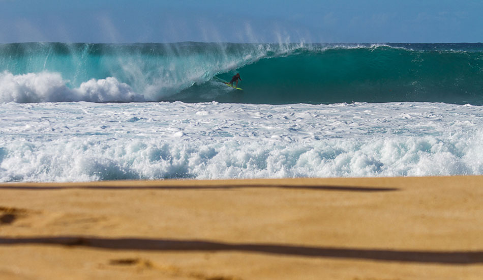 Off in the distance this guy is catching a sick barrel! Photo: <a href=\"http://500px.com/DougFalterPhotography\">Doug Falter</a>