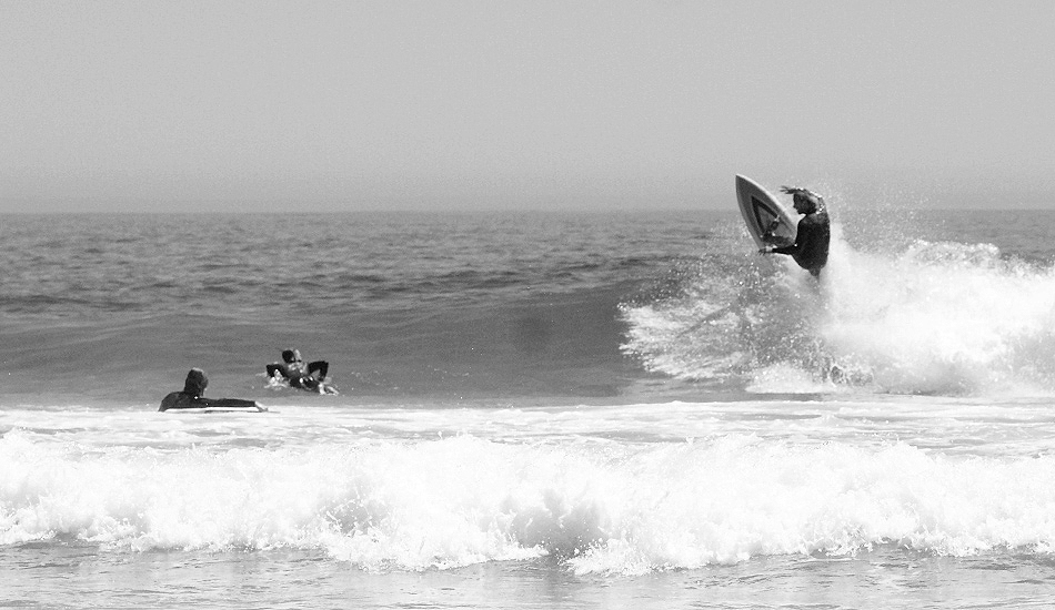 Brandon Jackson ripping on the old school board his dad made. © Jared Aufrichtig