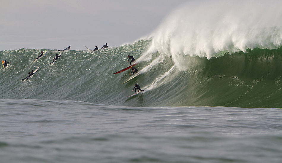 Party wave at Mavericks 2010. Todd Tissue, Ryan Augenstein and Tyler Fox. Photo: <a href=\"http://instagram.com/migdailphoto\"> Seth Migdail</a>