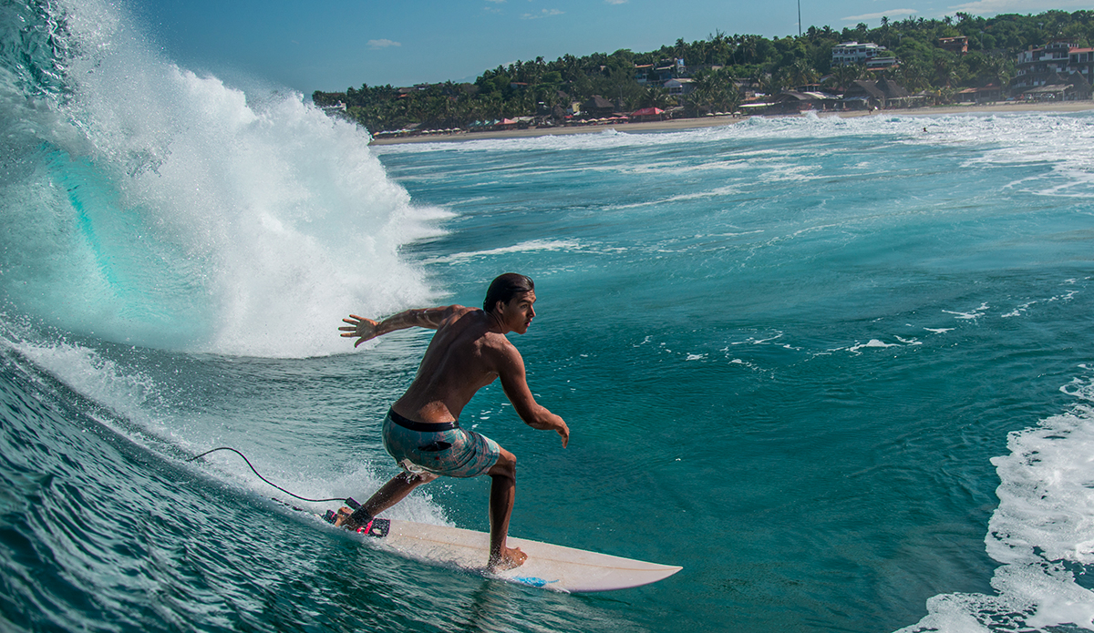 Marcial Monreal makes surfing at his home break, look like a piece of cake. He has definitely paid his dues at this heavy beach break. Marcial\'s wave count here is definitely one of the highest. Photo: Maria Fernanda