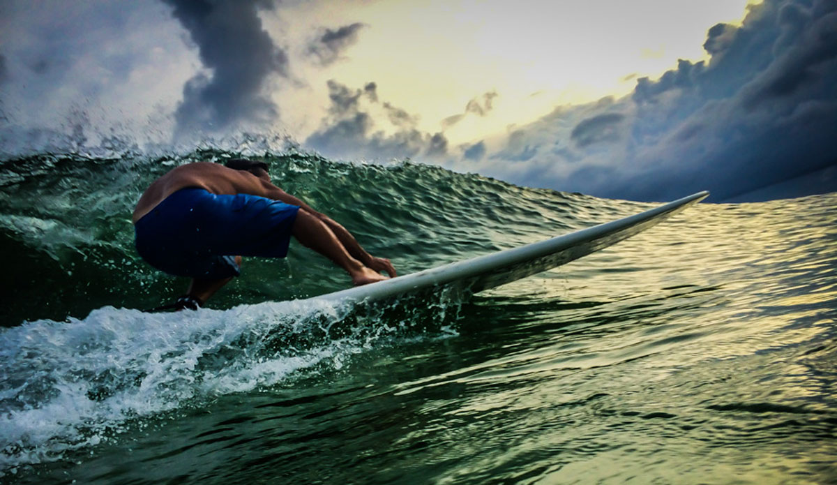 Bob Lavender using the hand drag to get down under the lip of the wave. Photo: <a href=\"https://richbrooksphotography.squarespace.com/\"> Rich Brooks</a>