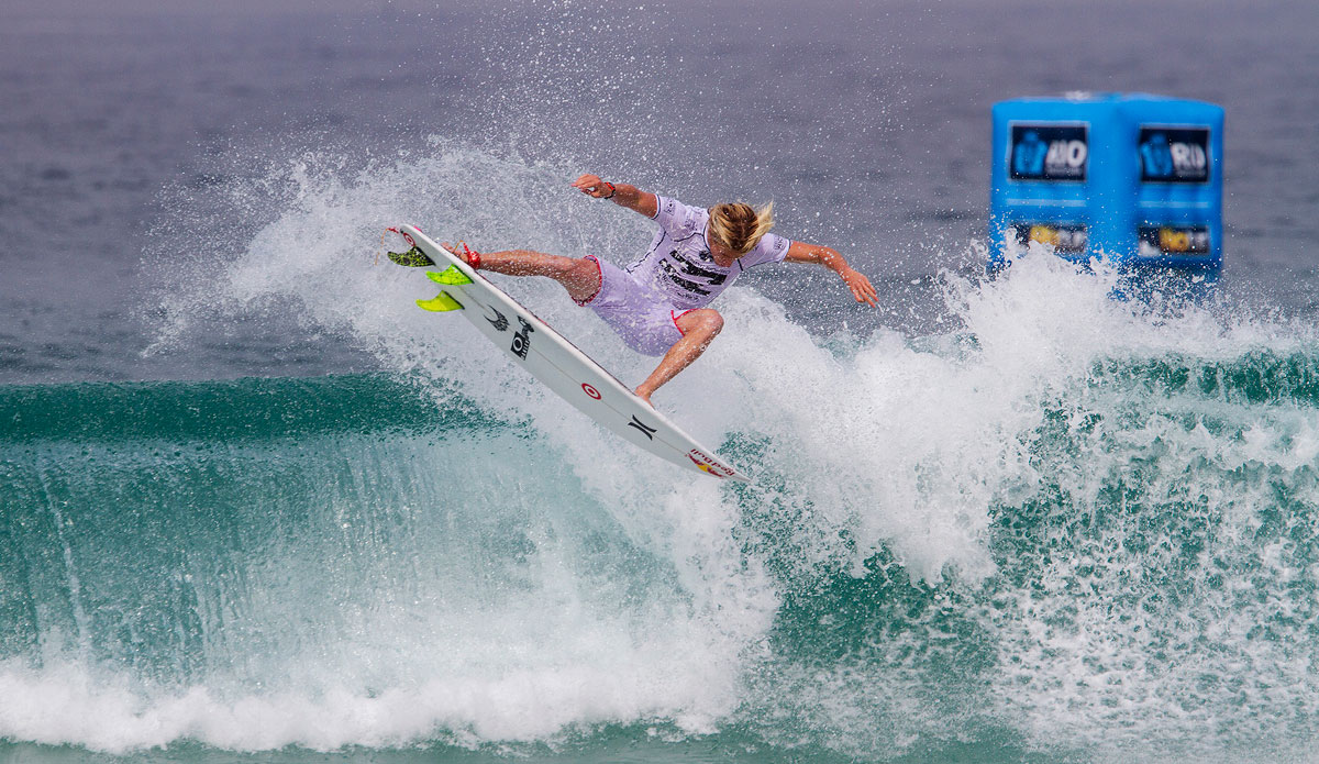 Kolohe Andino of San Clemente, California, USA (pictured) secured a well deserved Round 1 heat win over wildcard David do Carmo (BRA) and ASP World Champion Mick Fanning (AUS) to advance into Round 3 at the Billabong Rio Pro on Wednesday May 7, 2014. Kolohe Andino (USA) took full advantage of the no-wave-limit, hitting a keeper score with a draining barrel ride for a 6.17 and followed up with a 6.0 clean grab aerial manuever. Photo: <a href=\"http://www.aspworldtour.com/\">ASP / Smorigo</a>