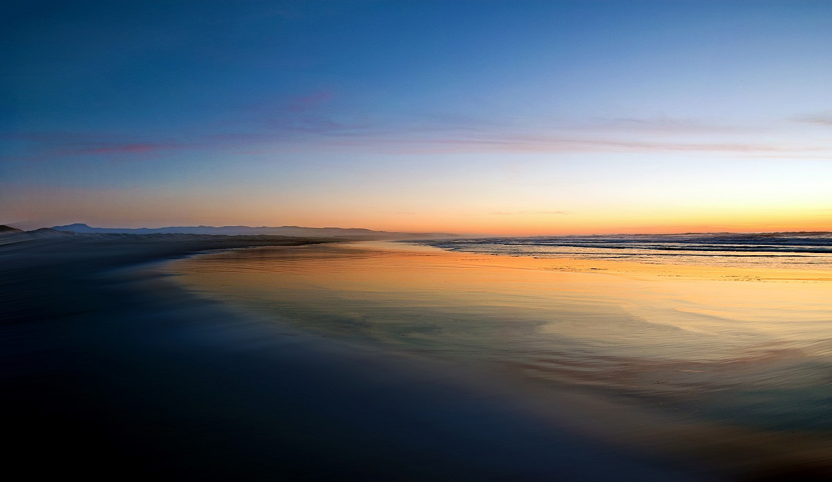 Surf Beach, Lompoc, California. Smooth ocean with flat water - an overall serene evening shot. Photo: <a href=\"www.californiametalphoto.com\">Robert Eovaldi</a>