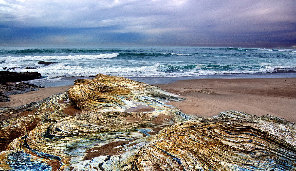 Central Coast California. Tranquil beach with incredibly colored rocks. Photo: <a href=\"www.californiametalphoto.com\">Robert Eovaldi</a>