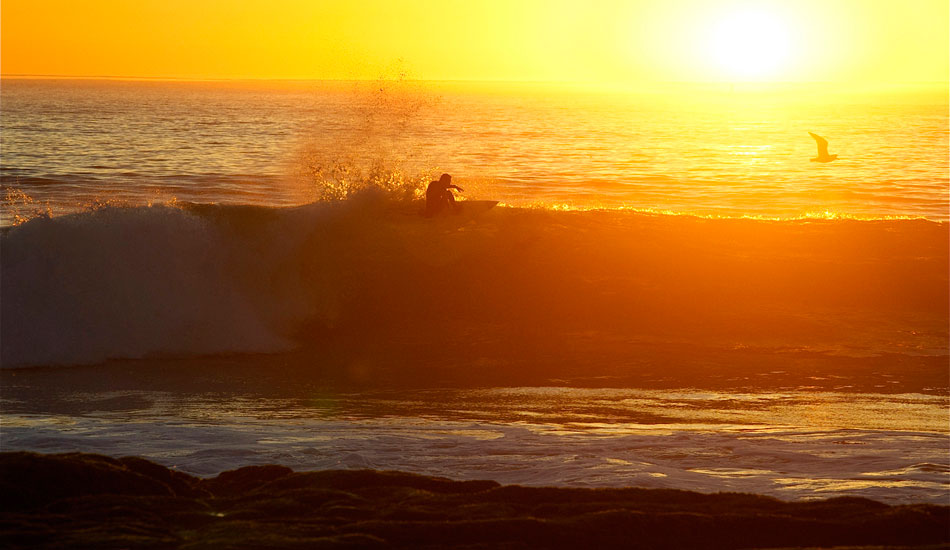 Tyler Fox isn\'t just about huge waves. He\'s also about doing massive functional floaters during golden hour. He stuck this. Photo: Robb Wilson