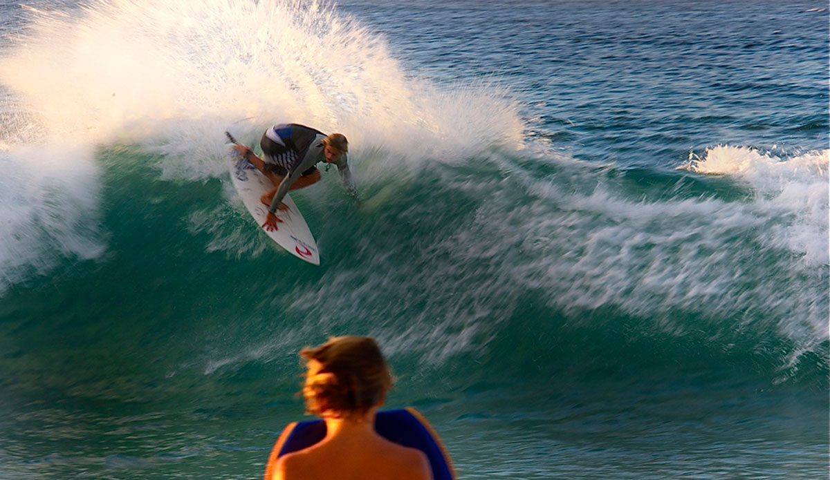 Noah \"Waggy\" Wegrich teaching the youth some backhand assault tactics in Hawaii. Photo: Robb Wilson