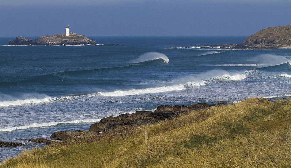 One of the most consistent, and busy, spots in Cornwall, England, is Godrevy. Photo: <a href=\"http://surfphoto.500px.com/home\"> Roger Sharp</a>