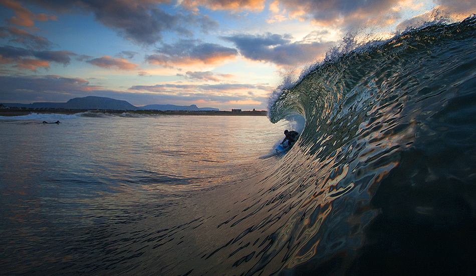 Ian Battrick getting the last tube home in Ireland. Photo: <a href=\"http://surfphoto.500px.com/home\"> Roger Sharp</a>