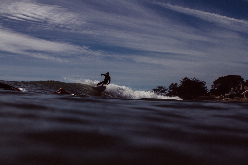 Curren Caples cruising through the cove at Rincon. Photo: <a href=\"www.russellholliday.com\">Russell Holliday</a>