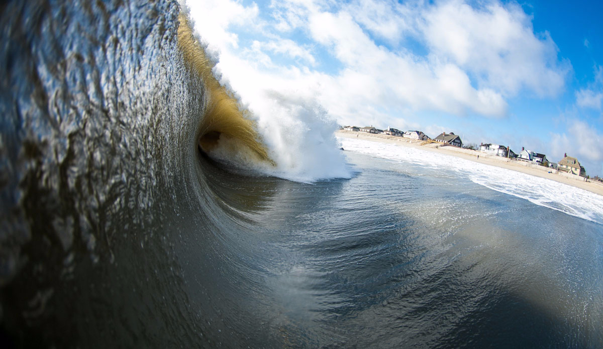 This day was another epic one for the books. Seven-nine feet, hollow as hell, and breaking perfectly on the sandbar. Most were too steep and hollow to get into. As you can see here, this thing is pretty much over-vert. I stalled in the lip to get this angle, then realizing I was going to get sucked over with the lip, I braced for impact. Photo: <a href=\"http://www.ryanmackphotography.com/\">Ryan Mack</a>