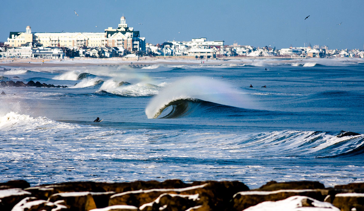 This image was taken about three years ago, when I first started shooting surf photos. Before there were 50 people shooting lineup photos from the beach. It was a picture perfect day, as you can tell. Sunny, eight inches of snow, glassy offshore winds, and good swell. Photo: <a href=\"http://www.ryanmackphotography.com/\">Ryan Mack</a>