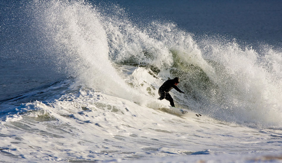 Sam Hammer hacking away at the snowy lip. Photo:<a href=\"http://ryanmackphoto.blogspot.com/\" target=_blank>Ryan Mack</a>.