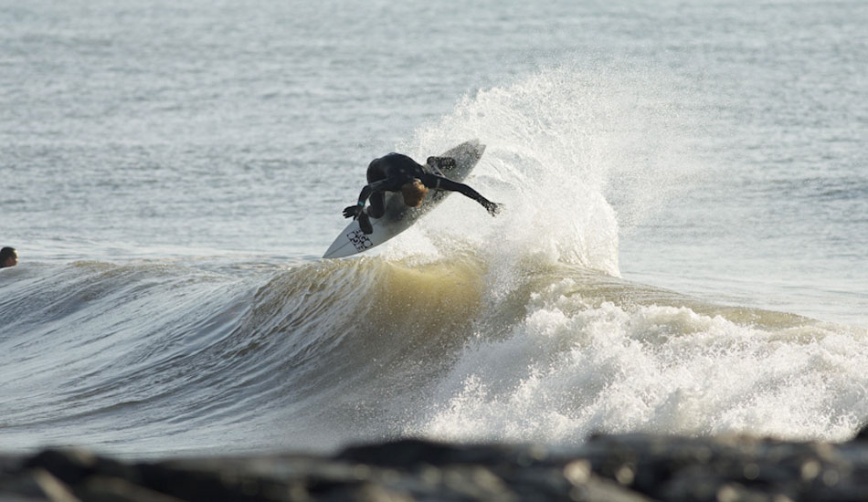 Ihnken on his strong back hand. Photo:<a href=\"http://ryanmackphoto.blogspot.com/\" target=_blank>Ryan Mack</a>.