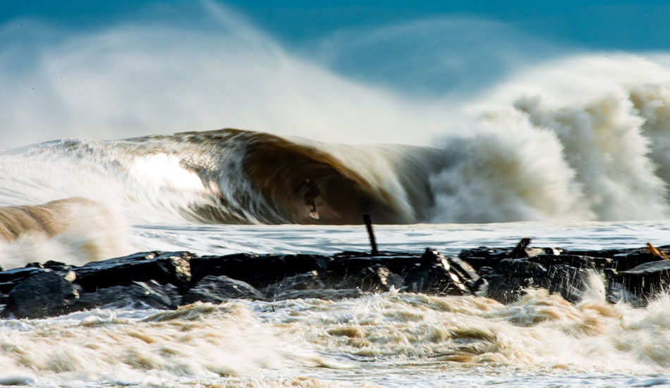 Travis Beckman, speed blur during December\'s doomsday swell. Photo: <a href=\"http://instagram.com/ryanmackphoto\">Ryan Mack</a>