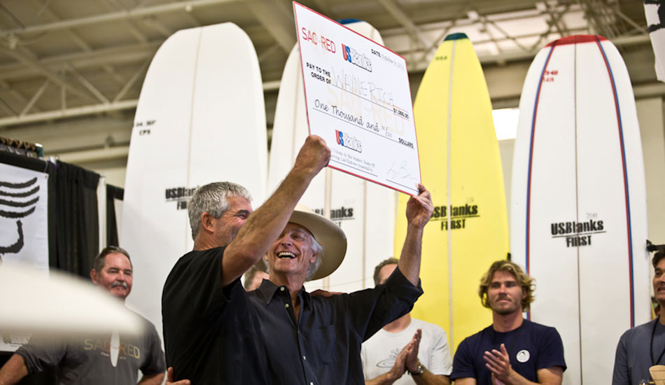 Wayne Rich the winner\'s check. He hoisted the board above his head and did a drawn-out victory spin. Photo: <a href=\"http://sorenheil.wordpress.com/\" target=_blank>Soren Heil</a>.