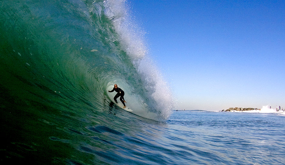 Darren Brillhart is a great surfer and a well-established surf contest organizer. Here Darren sneaks one in before the heats get started. Photo: <a href=\"http://sardelis.com/\" target=\"_blank\">Sardelis.com</a>/<a href=\"http://hbsurfshot.blogspot.com/\" target=\"_blank\">HBSurfShot.Blogspot.com</a>