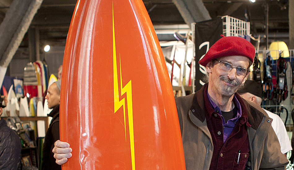 Tom Dadant happily shows off the lightning bolt on the deck of his surfboard. He says the board was a gift from an old friend who allegedly got it from Gerry Lopez himself. Dadant intends to send Lopez images of the board to try to verify its origins. Photo: Maggie Yount