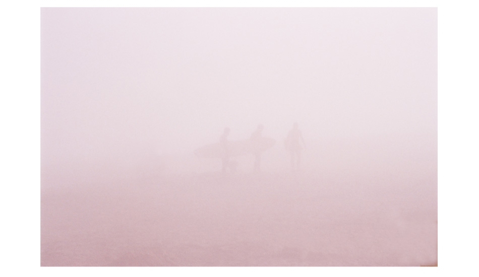 Purple Portugal Fog. I took this polaroid in Peniche, Portugal. It was 7 am, 55 degrees and drizzling. I was about to get grouchy about the weather when I saw these figures emerging from the fog. I threw everything I was carrying down and started shooting. It shut my mind up for the rest of the trip. I was in Portugal, surfing and taking pictures. Image: <a href=\"http://shehitpausestudios.com/\" target=\"_blank\">Schwartz</a>