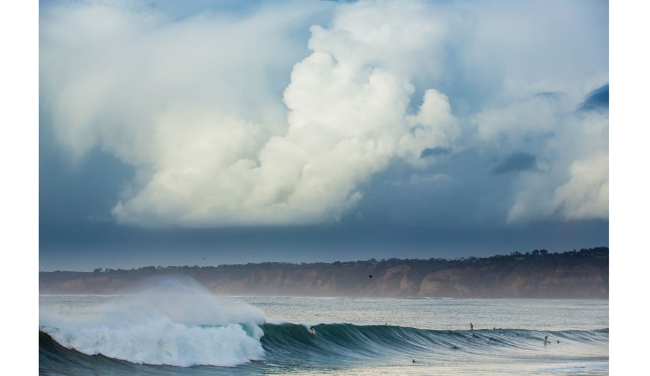 Those clouds in the background are the remnants of a storm that produced the wave in the foreground. Photo: <a href=\"http://anthonyghigliaprints.com\">Anthony Ghiglia</a>