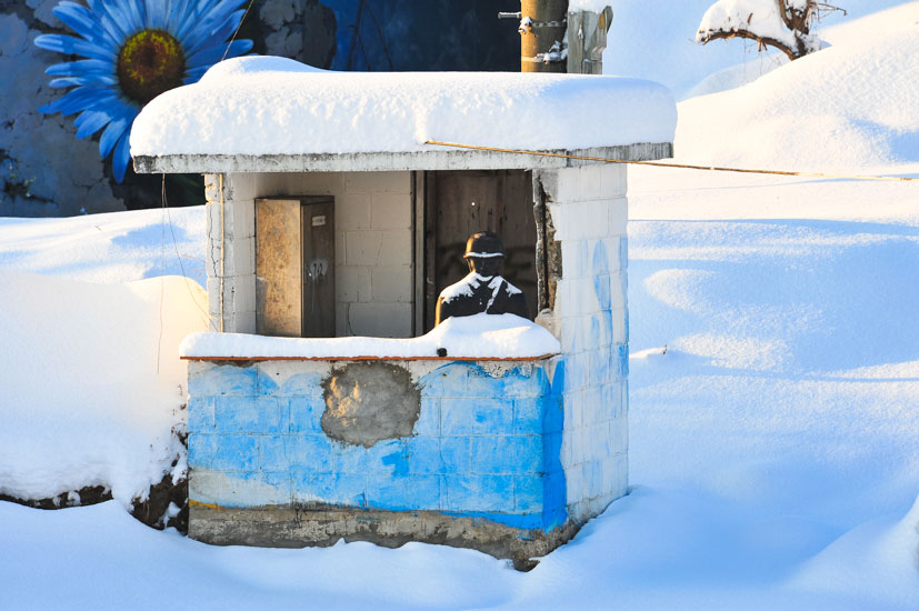 One of the ROK decoy stations. The plastic soldier is covered after a massive snowfall in January. Photo: <a href=\"http://www.shannonaston.com/\" target=_blank>Shannon Aston</a>.