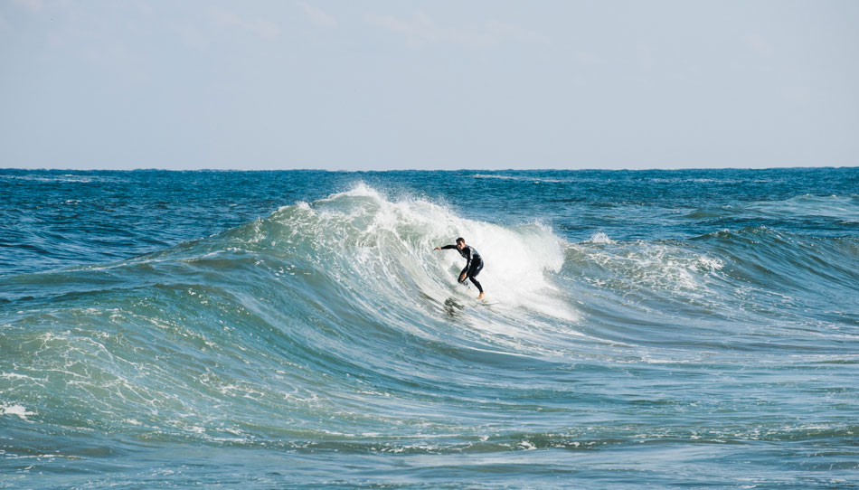 Kiwi Brendon Smith stands tall and admires this North Asia mutant wedge. Photo: <a href=\"http://www.shannonaston.com/\" target=_blank>Shannon Aston</a>.