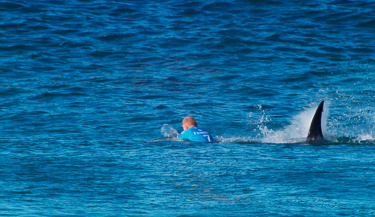 Mick Fanning Of Australia looks back shortly before being attacked by a shark during the Final of the JBay Open on Sunday July 19, 2015. Screengrab: <a href=\"http://www.worldsurfleague.com/\">WSL</a>

