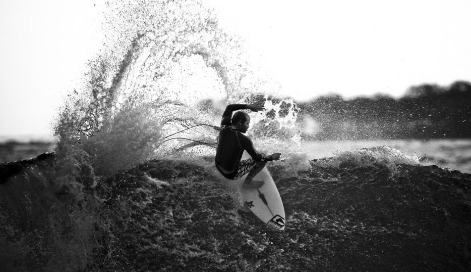 Damien Hobgood at Maccas.  This was the first time I swam with my big pelican case over reef with far too much equipment.  Photo: <a href=\"http://www.jefffarsaiphotography.com/\">Jeff Farsai</a>