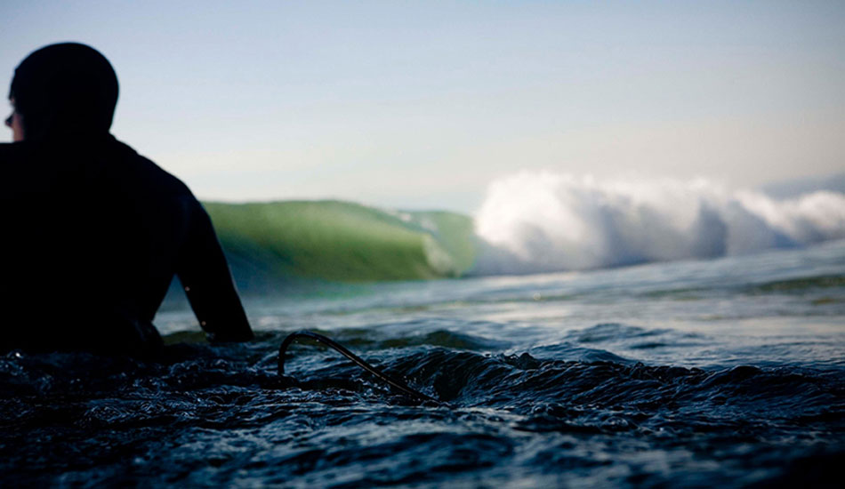 My favorite wave in Santa Barbara offering up a little diffused light from a pier overhead.