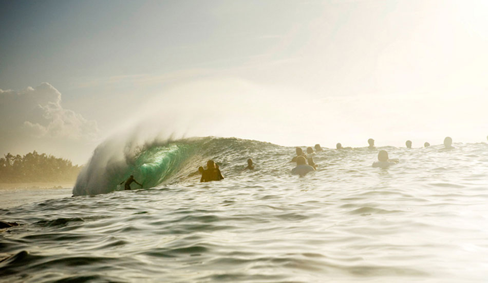 Pipeline again.  Even with all of the photographers, it’s hard to get sick of shooting here.  I love this image because it shows the mayhem in the lineup with surfers and photographers a-like.  