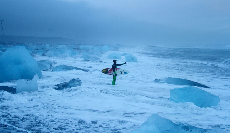 Mid winter Iceland. Snow fall, only about four hours of light, a wind chill way below freezing and a field of Icebergs to get through before you can surf. Ian Battirck getting ready for a standard solo session. Image: <a href=\"http://www.timnunn.co.uk\" target=\"_blank\">Nunn</a>