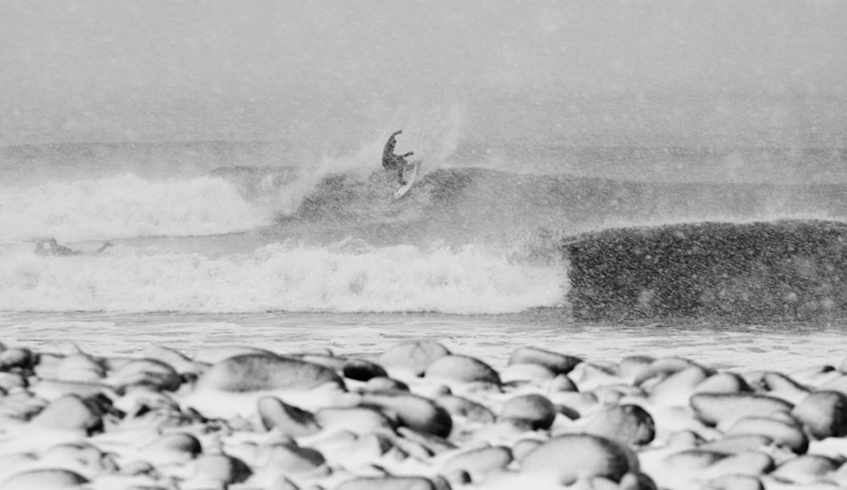 Nico Manos, on possibly the snowiest day that I\'ve attempted to take surf photos on. Photo: Zak Bush 