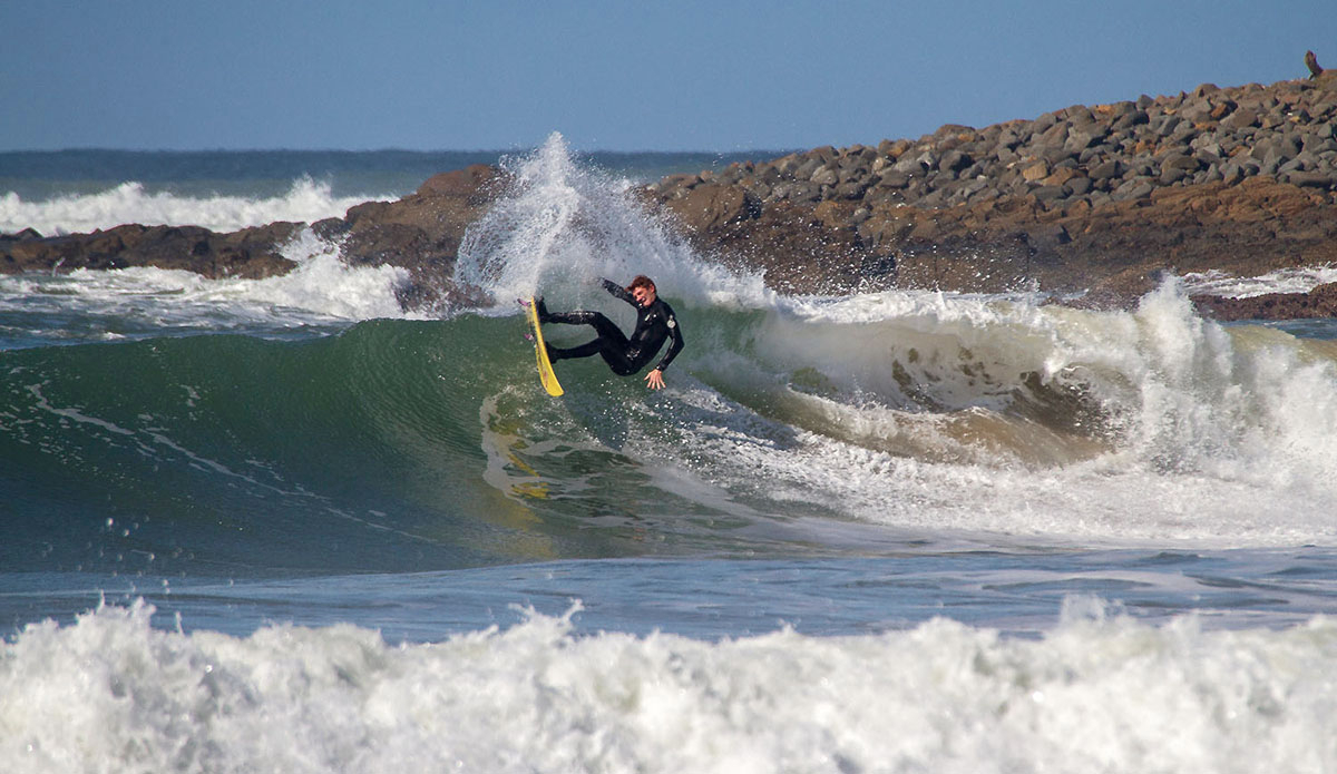 Michael Monk laying into a ripple wall down the road from home. Photo: <a href=\"https://www.facebook.com/pages/Pho-Tye-Studio/398591356893177?fref=nf\"> Tyerell Jordaan</a>