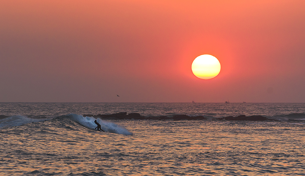 Surf \'til you drop. The waves never stopped. Photo: Charles Audet