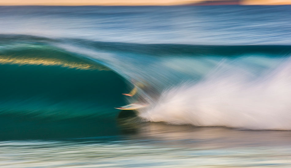 Kneerider Chayne Simpson blurs through a local creek mouth. Photo: <a href=\"http://www.16images.com.au\">Steen Barnes</a>