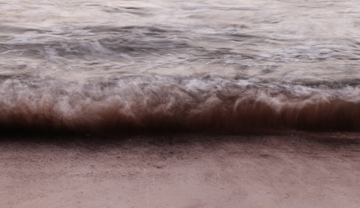 The Wall. This is a long exposure of a rising wall of water, ready to burst on the face of a sandy surface. Photo: <a href=\"http://rickycavarra.com\">Ricky Cavarra</a>