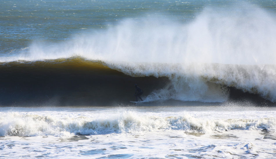 Local Artist, John Glenn, looking for another cover up on a heavy one. Photo: <a href=\"http://www.rozbernsurf.com\":> Kevin Strickland</a>