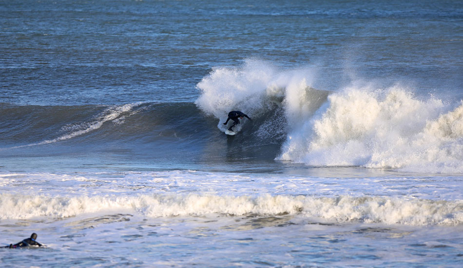 Rozbern Shaper, John Oppito, feeling out his rails backside on his newly shaped board. Photo: <a href=\"http://www.rozbernsurf.com\":> Kevin Strickland</a>