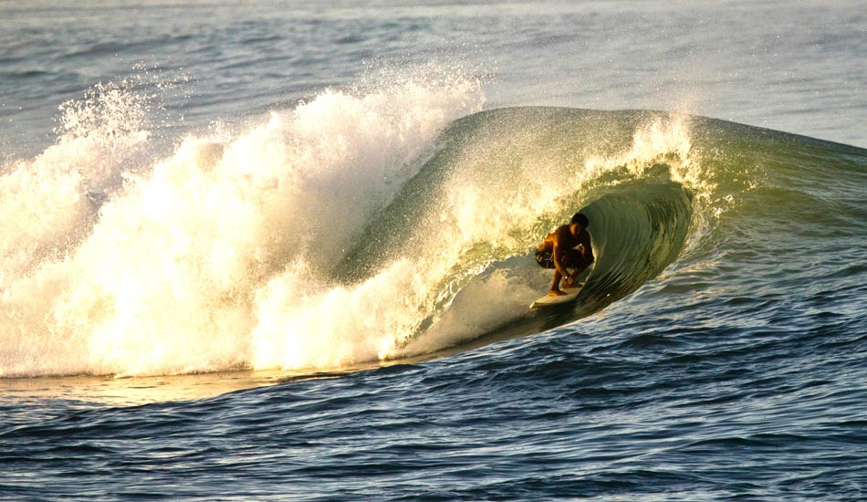 Tucked in deep at Ala Moana Bowls. Photo: Phil LeRoy