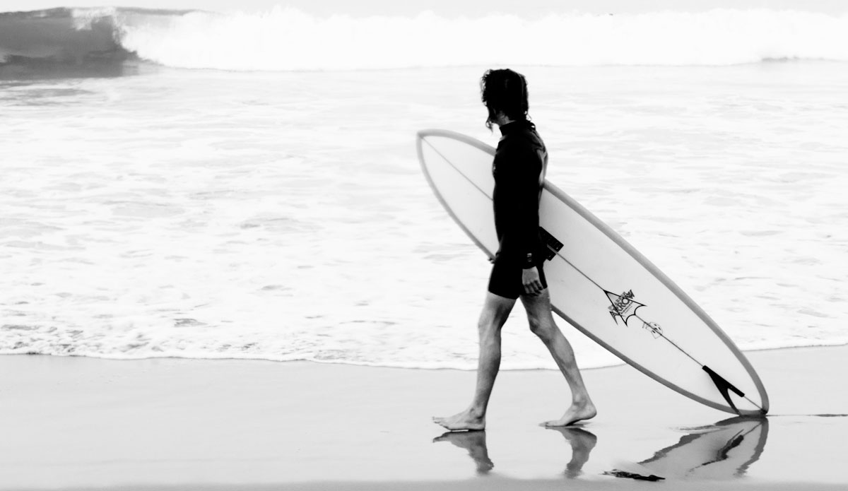 Will Iermini. Walk back up the beach after retrieving his board. Newport Beach, CA. Photo: <a>Kevin Jansen</a>