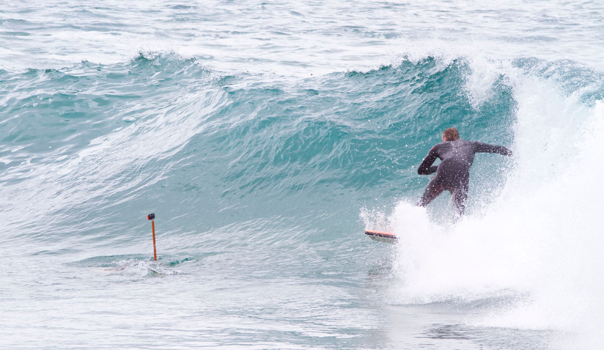 Jamie\'s first wave this session he broke the nose off his board, paddled back out, and caught this wave. Photo: <a>Kevin Jansen</a>