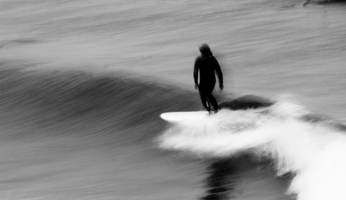 This is from Santa Cruz. I took this photo of someone I didn\'t know who had a great style. Thanks to the world wide web, the surfer found the photo. He was stoked to get a shot of him riding his dad\'s board he bought new in the 60\'s. Photo: <a>Kevin Jansen</a>