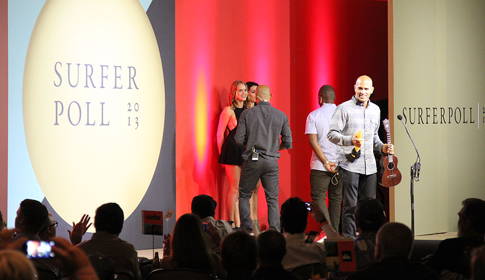 Kelly was presented these awards for being the most highly voted man in surfing.