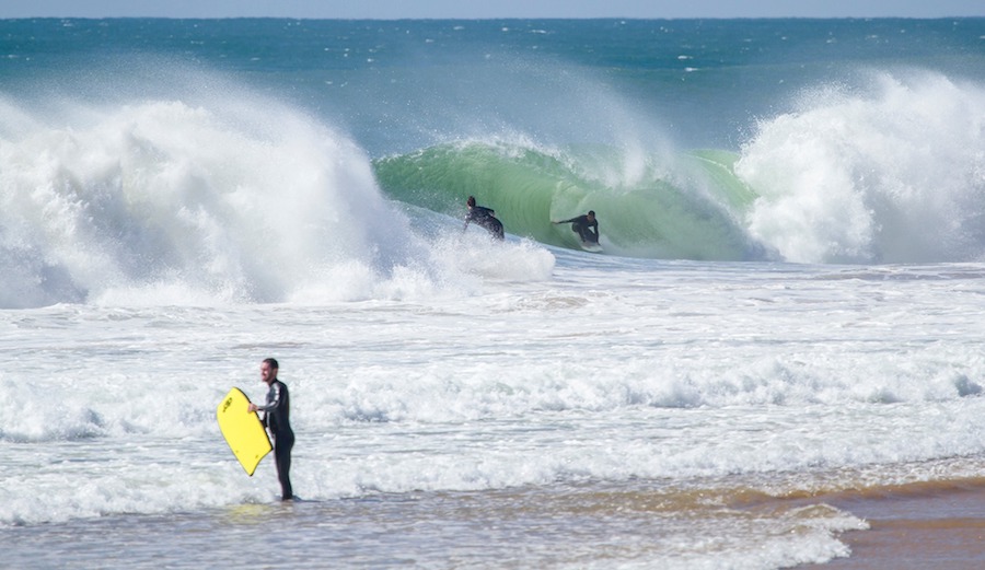 Three guys, three different situations. Heavy traffic at one of Lisbon’s best beach breaks. Carcavelos, Portugal. 3/4/17. Photographer: Alvaro Fr